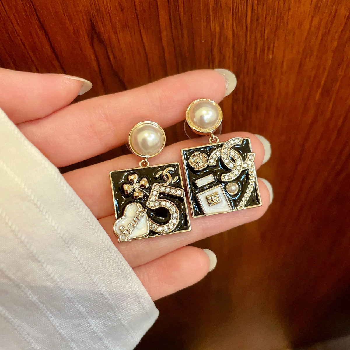 Martin Graham earrings in polished metal-tone – side detail