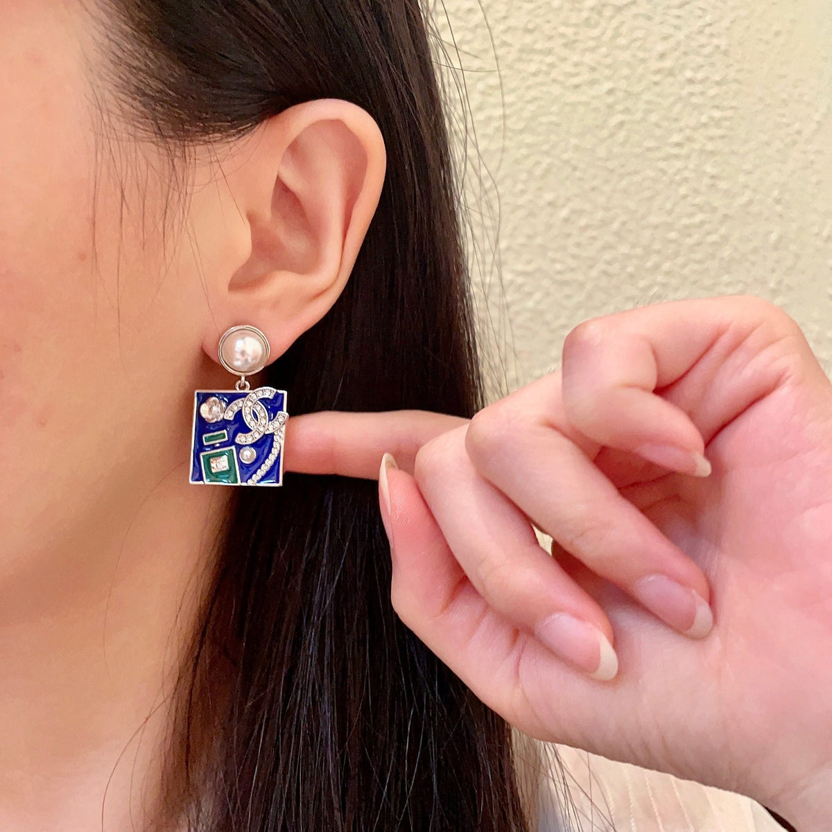 Martin Graham earrings in polished metal-tone – front product view