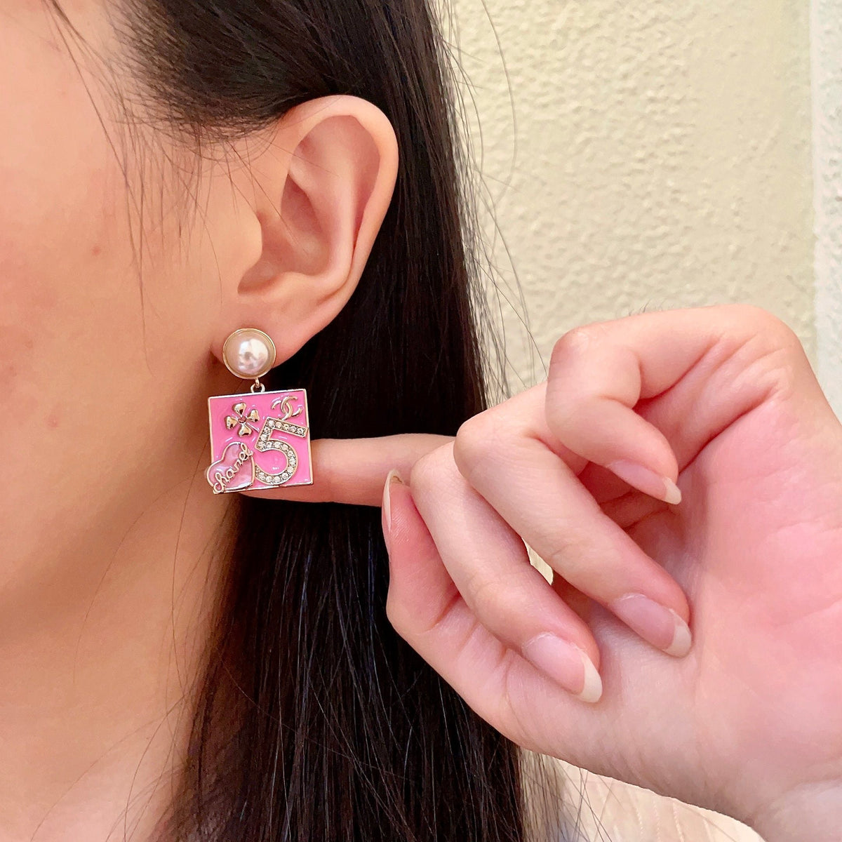 Martin Graham earrings in polished metal-tone – front product view