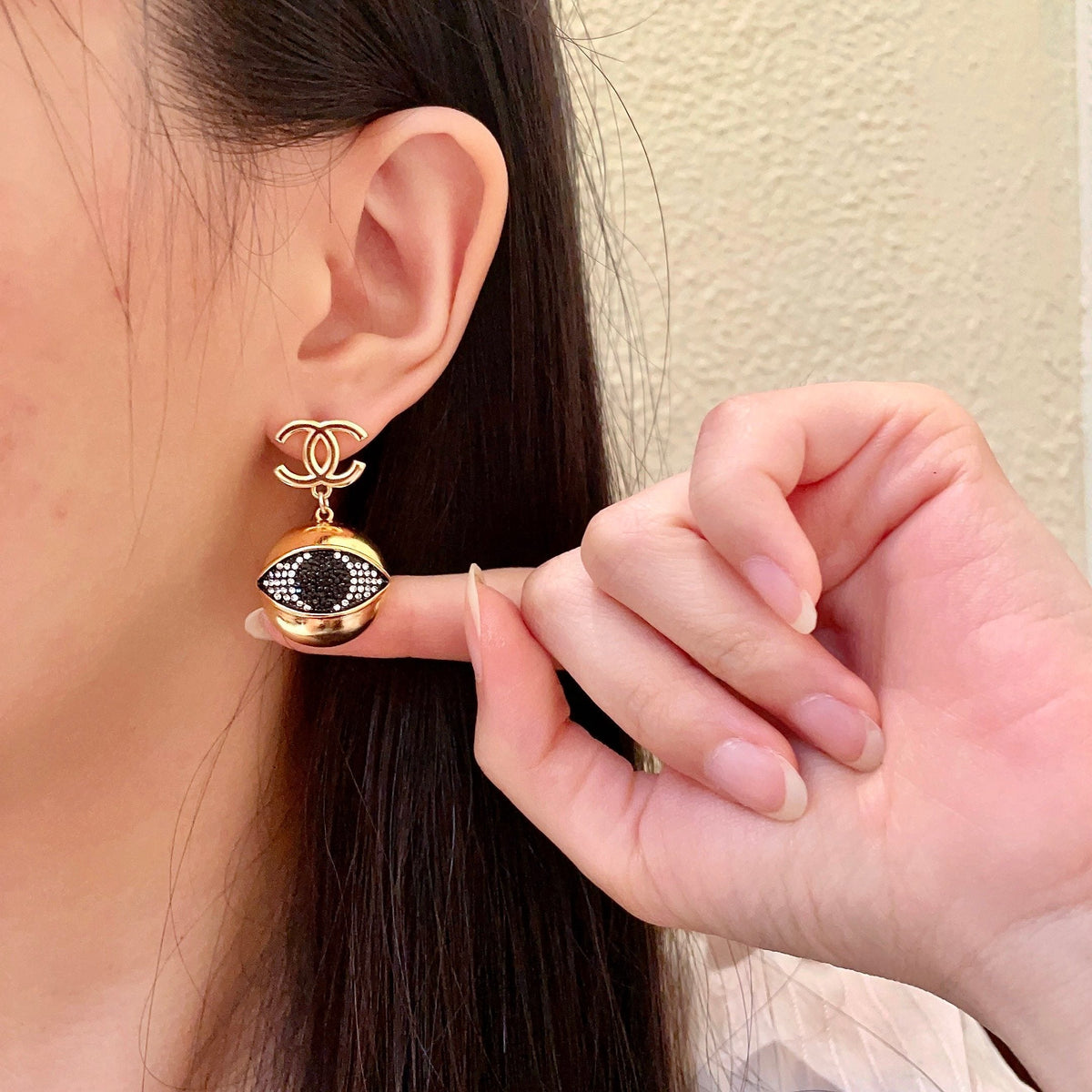 Martin Graham earrings in polished metal-tone – front product view