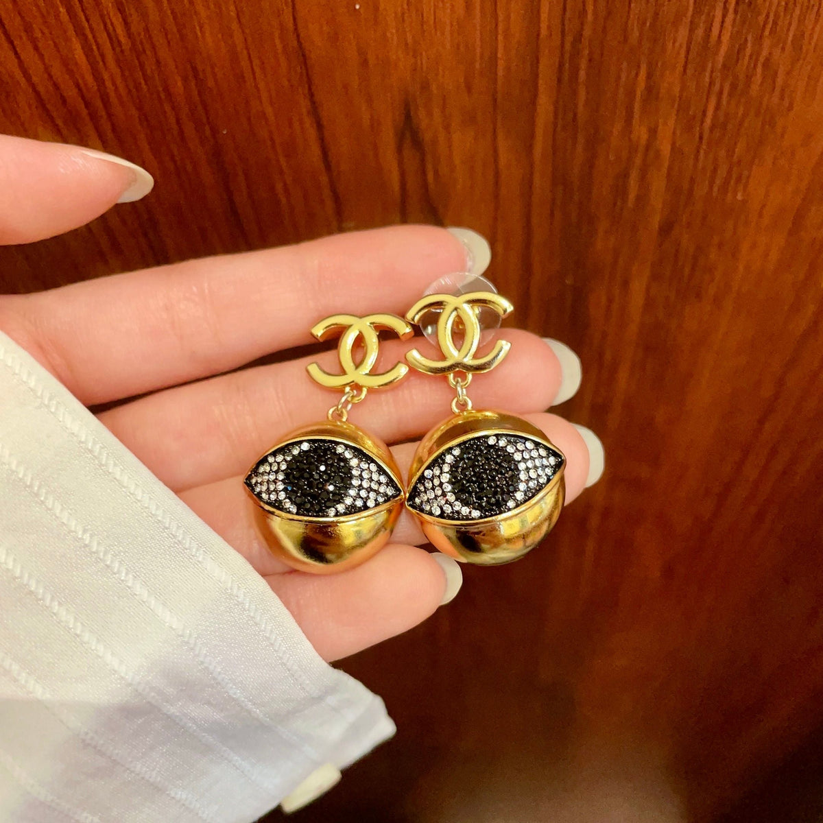 Martin Graham earrings in polished metal-tone – detail view