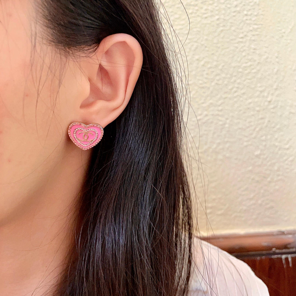 Martin Graham stud earrings in polished metal-tone – detail view