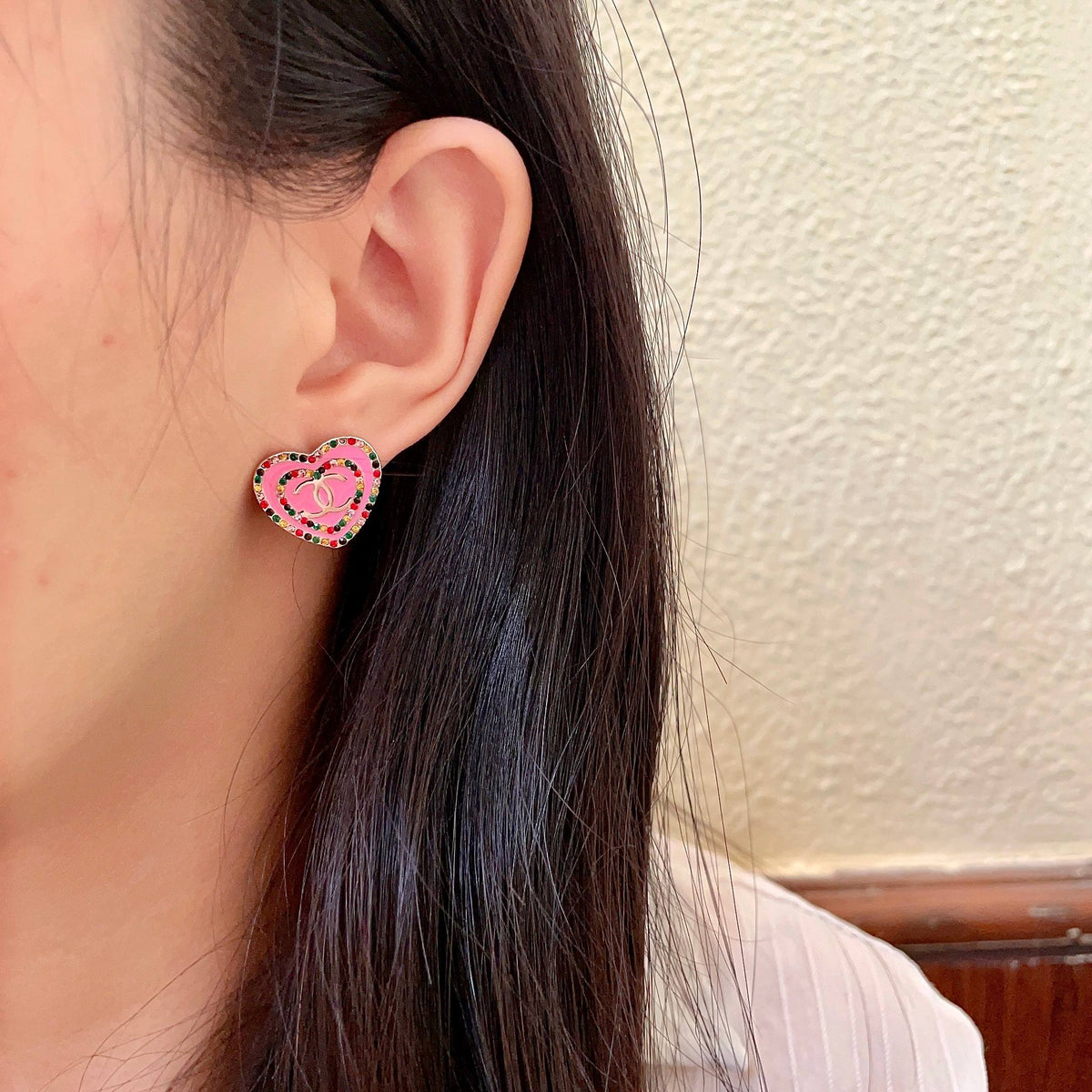 Martin Graham stud earrings in polished metal-tone – detail view