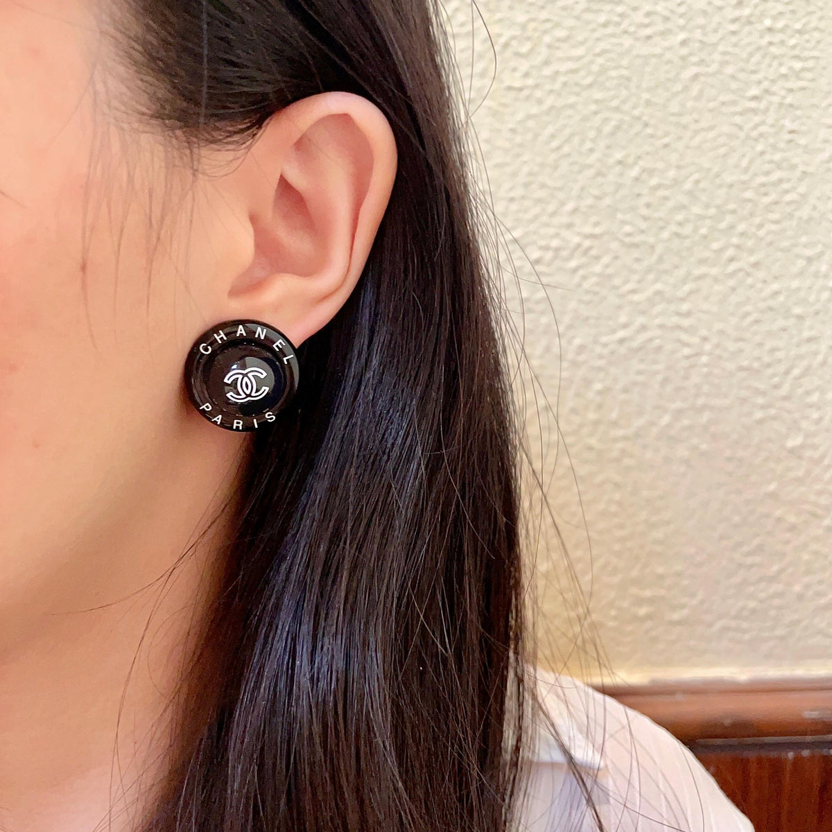 Martin Graham stud earrings in polished metal-tone – detail view