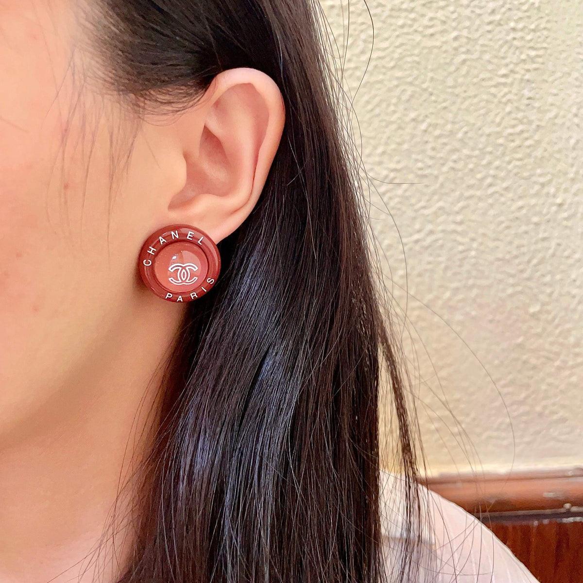 Martin Graham stud earrings in polished metal-tone – detail view