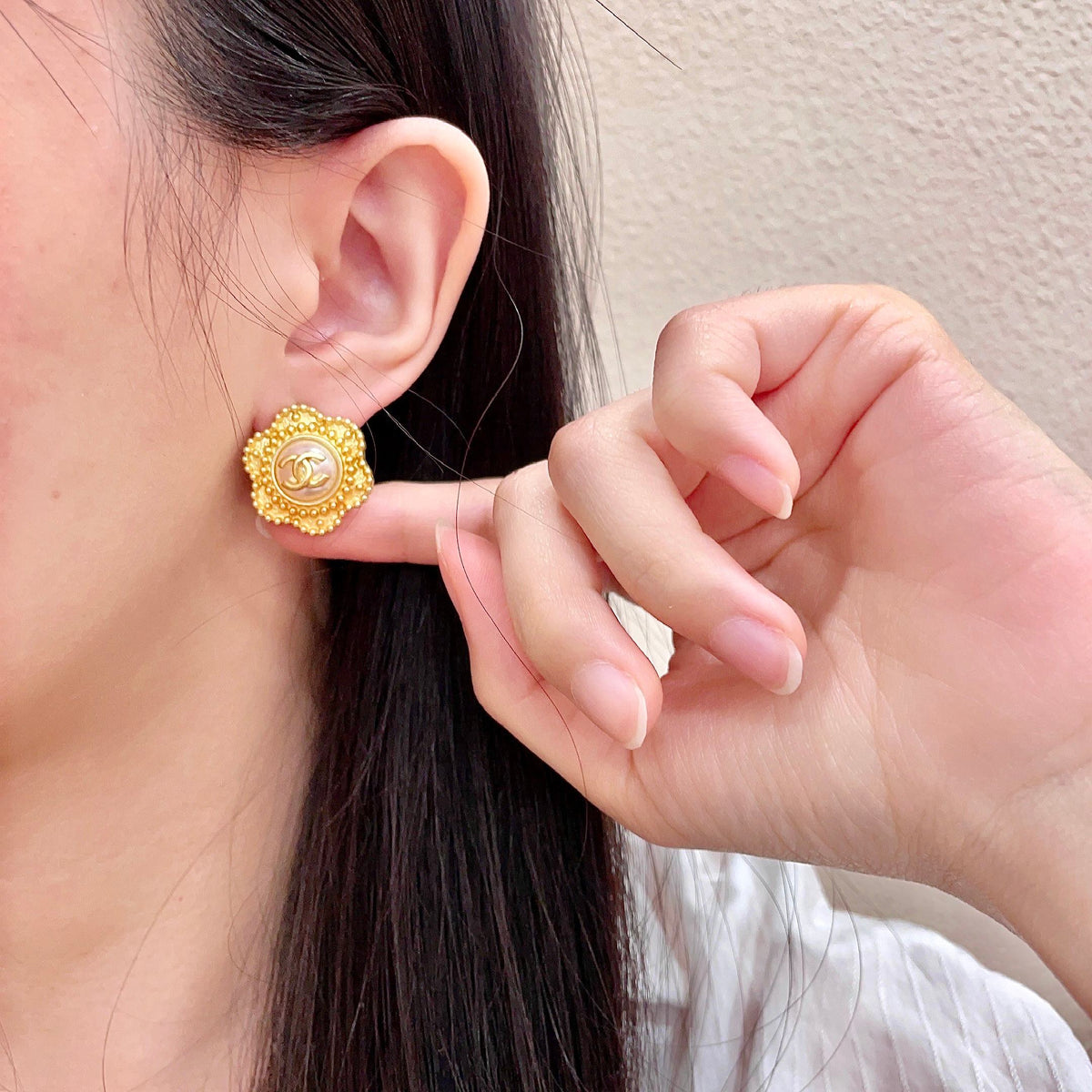 Martin Graham stud earrings in polished metal-tone – front product view