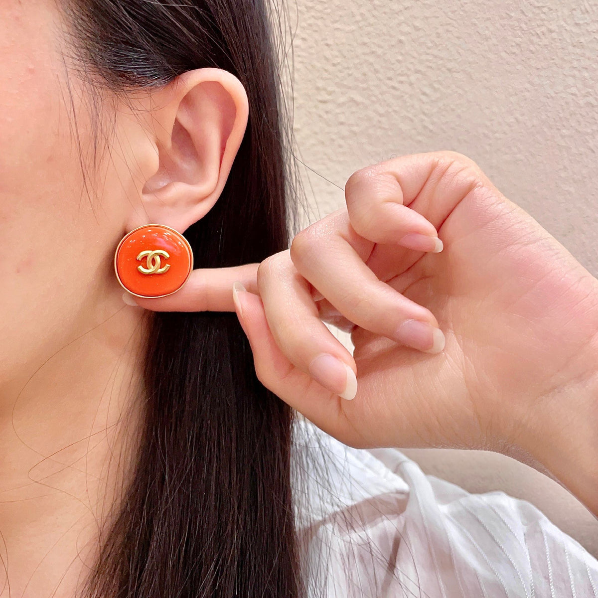 Martin Graham stud earrings in polished metal-tone – front product view