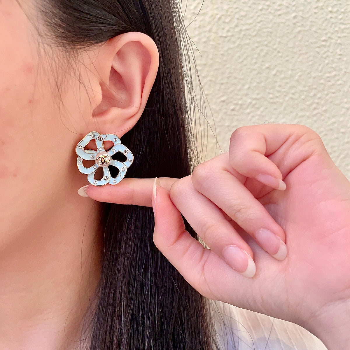Martin Graham stud earrings in polished metal-tone – front product view