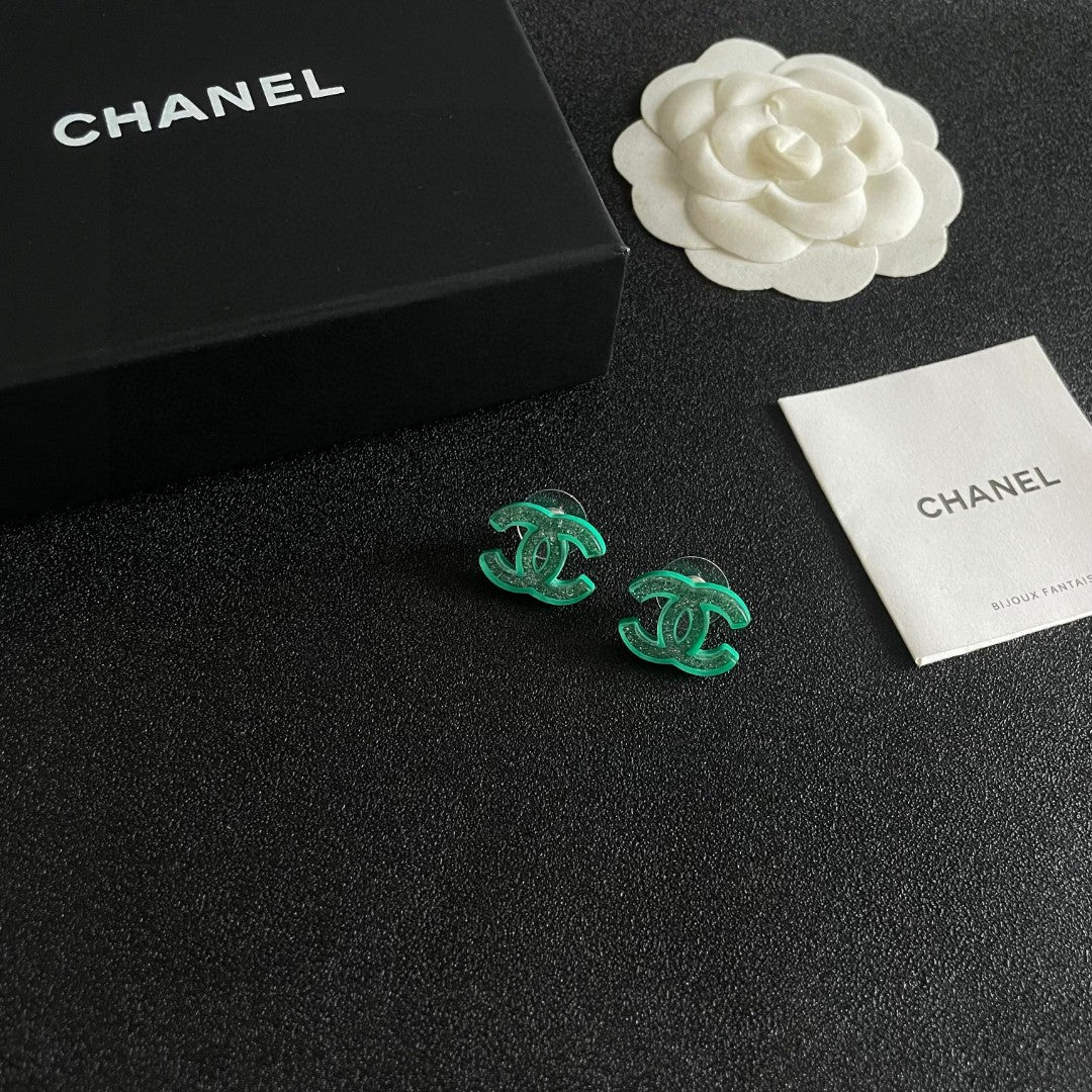 Martin Graham stud earrings in polished metal-tone – styled product view