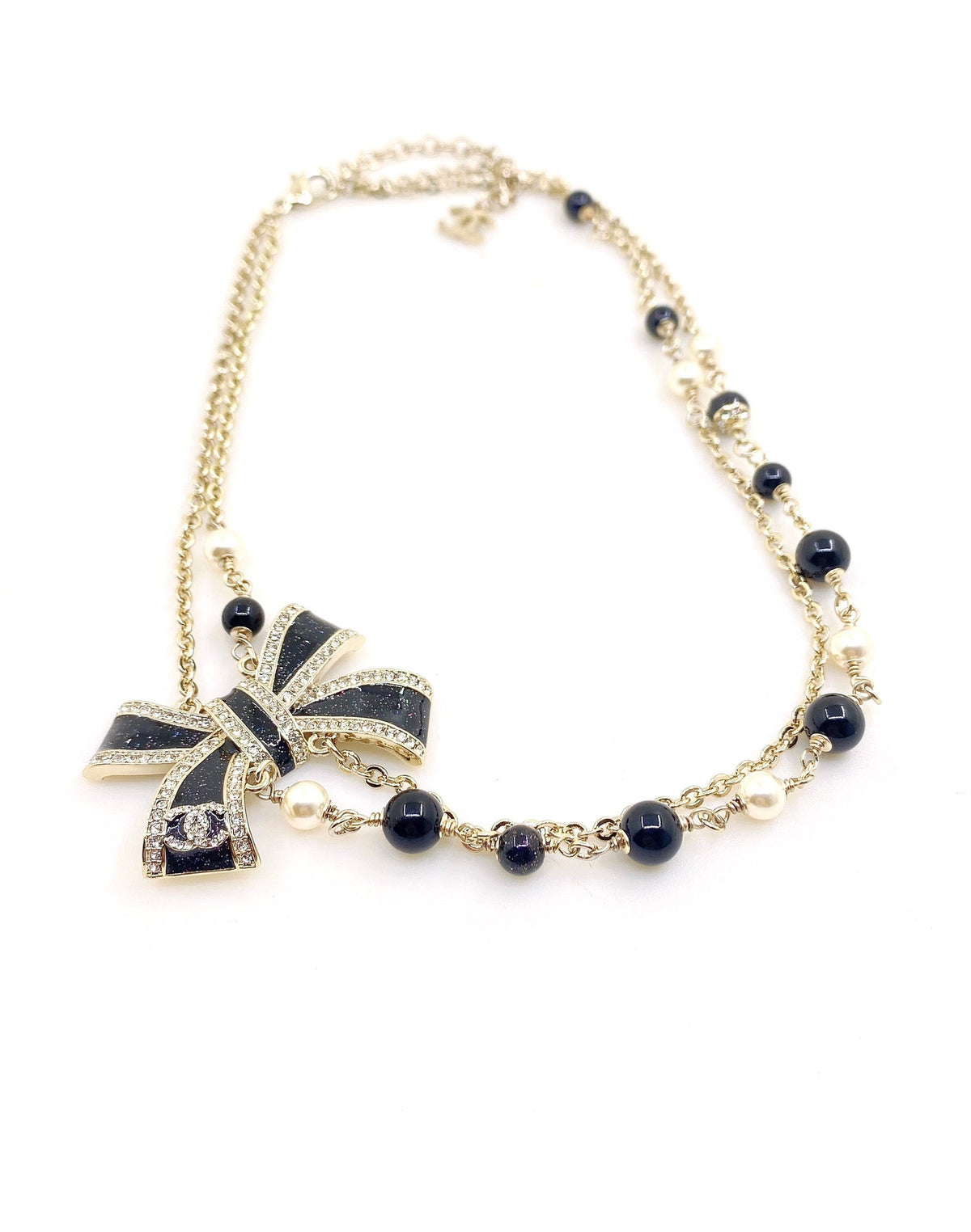 Martin Graham pendant necklace in polished metal-tone – detail view