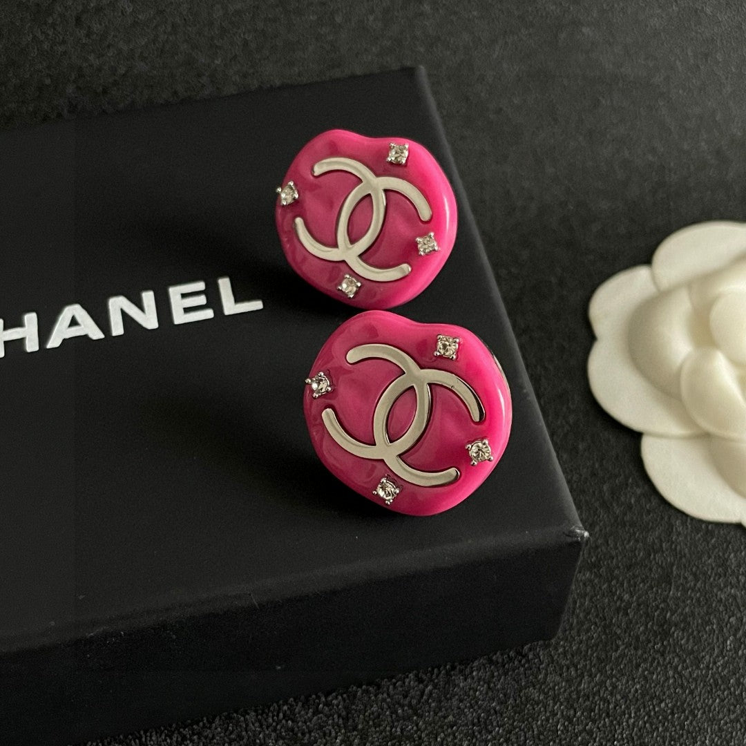 Martin Graham stud earrings in polished metal-tone – detail view