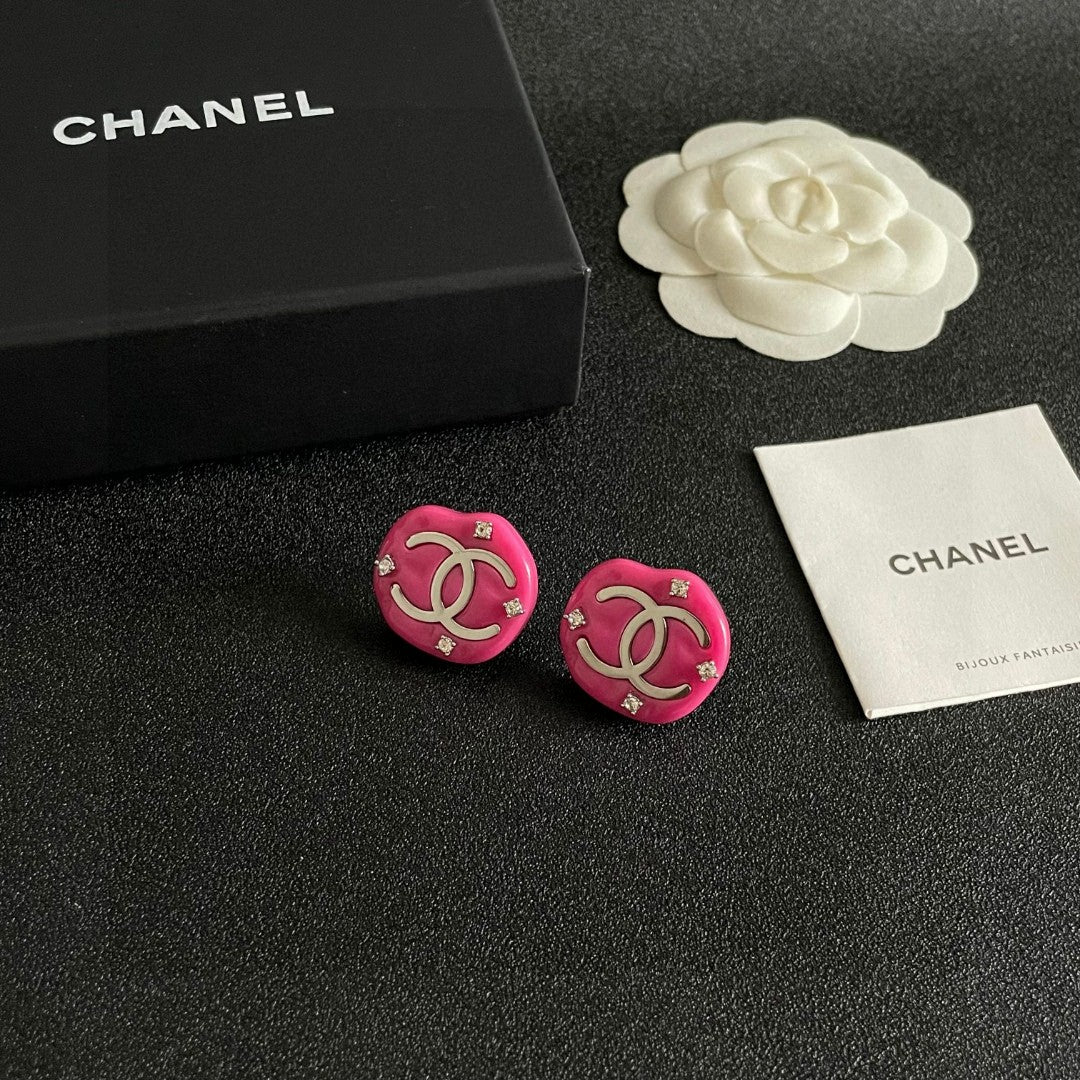 Martin Graham stud earrings in polished metal-tone – styled product view
