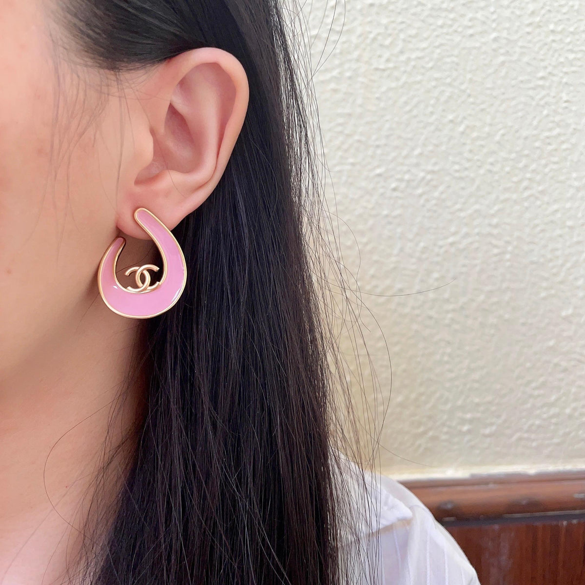 Martin Graham stud earrings in polished metal-tone – detail view