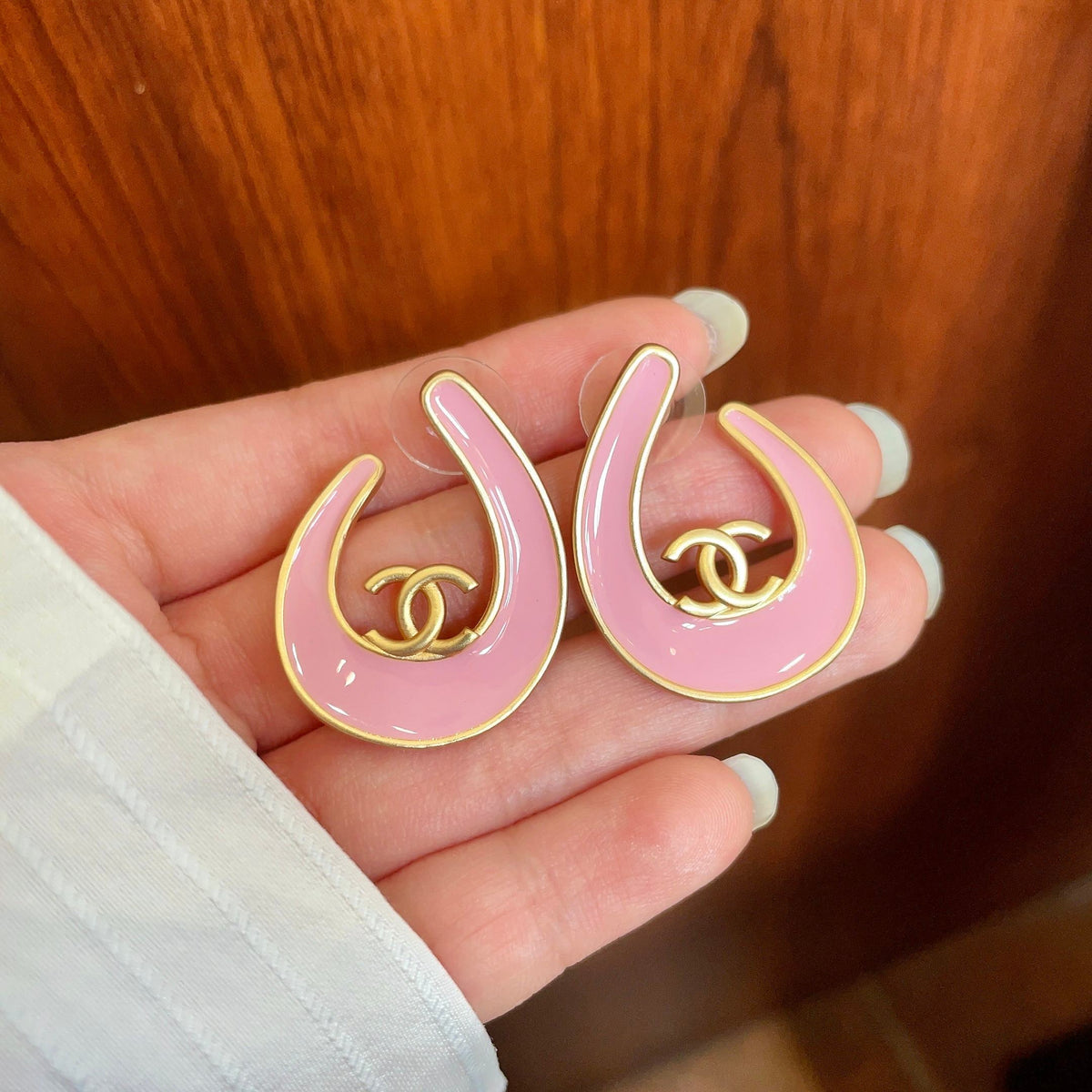 Martin Graham stud earrings in polished metal-tone – side detail