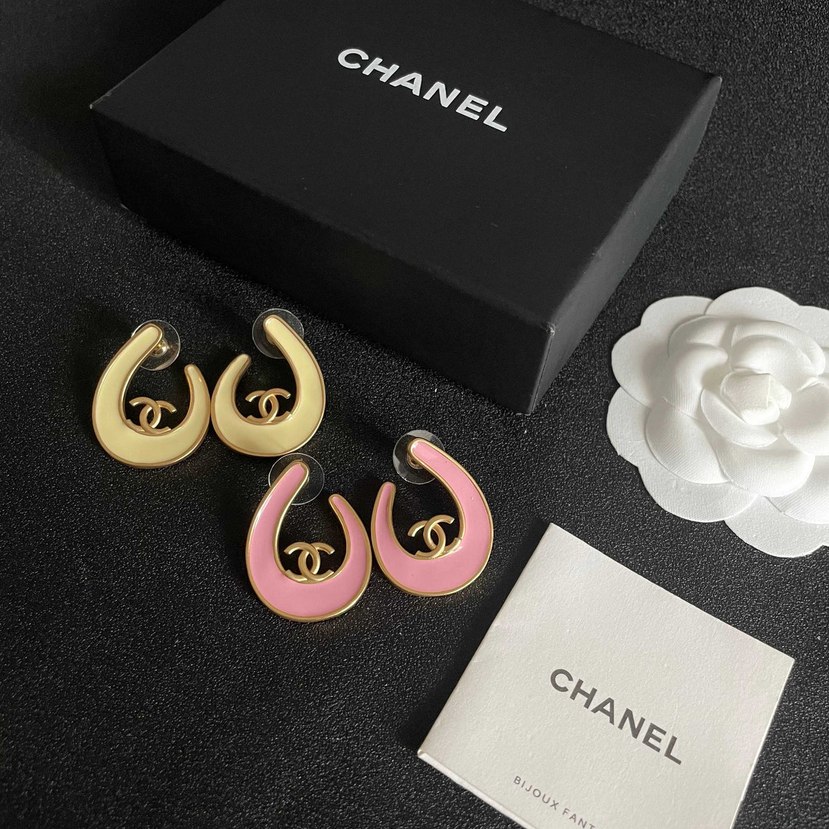 Martin Graham stud earrings in polished metal-tone – close-up detail