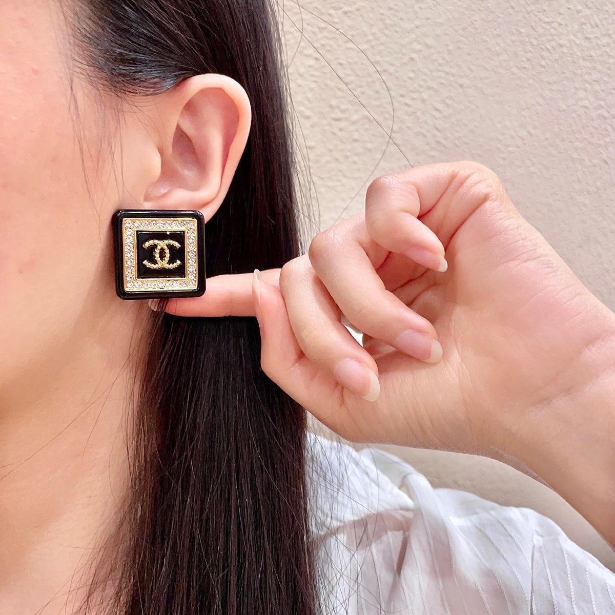 Martin Graham stud earrings in polished metal-tone – front product view