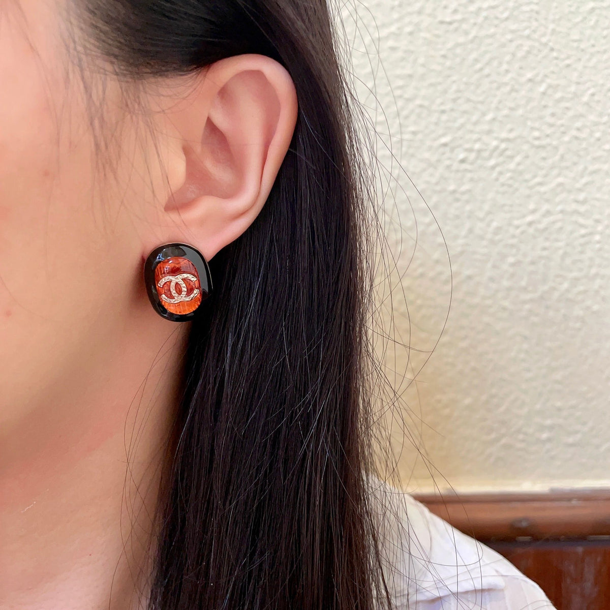 Martin Graham stud earrings in polished metal-tone – detail view
