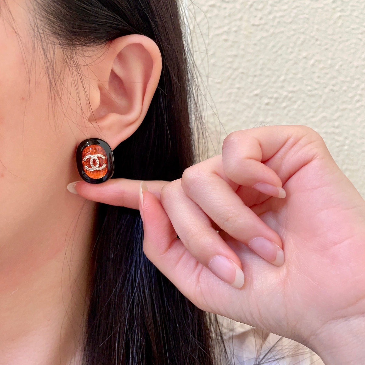 Martin Graham stud earrings in polished metal-tone – front product view