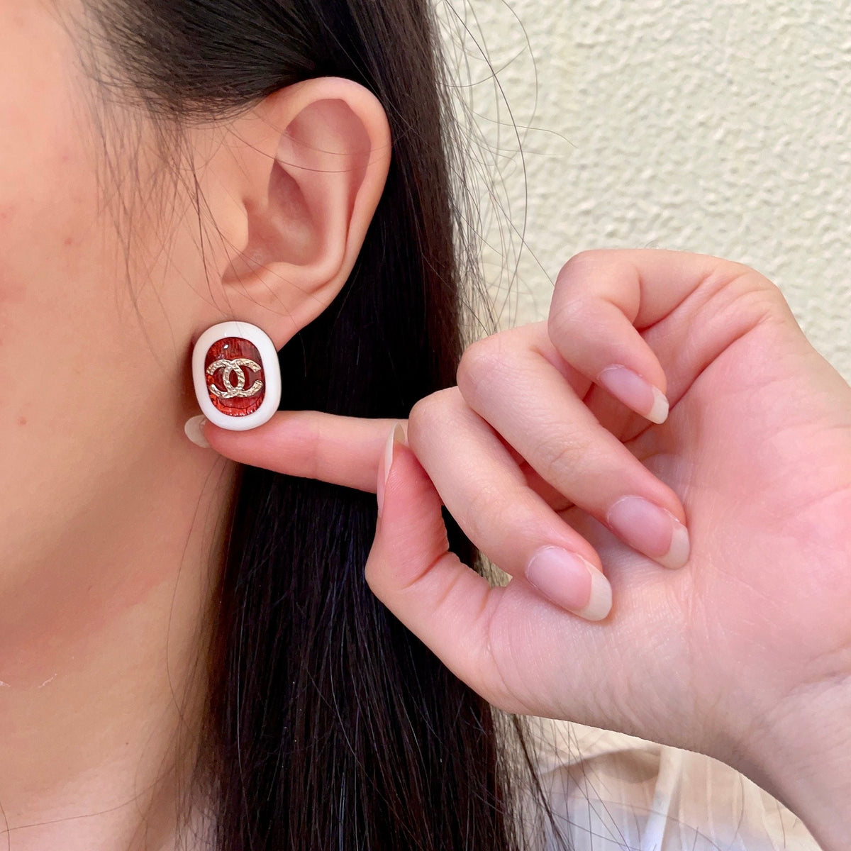 Martin Graham stud earrings in polished metal-tone – front product view