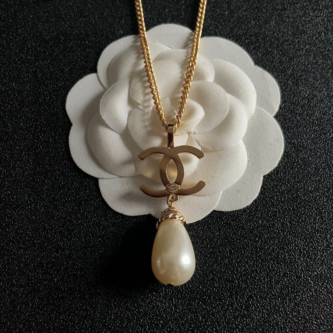 Martin Graham pendant necklace in polished metal-tone – front product view