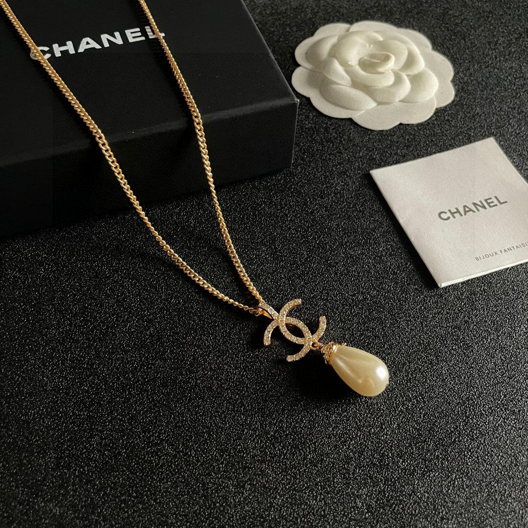 Martin Graham pendant necklace in polished metal-tone – styled product view
