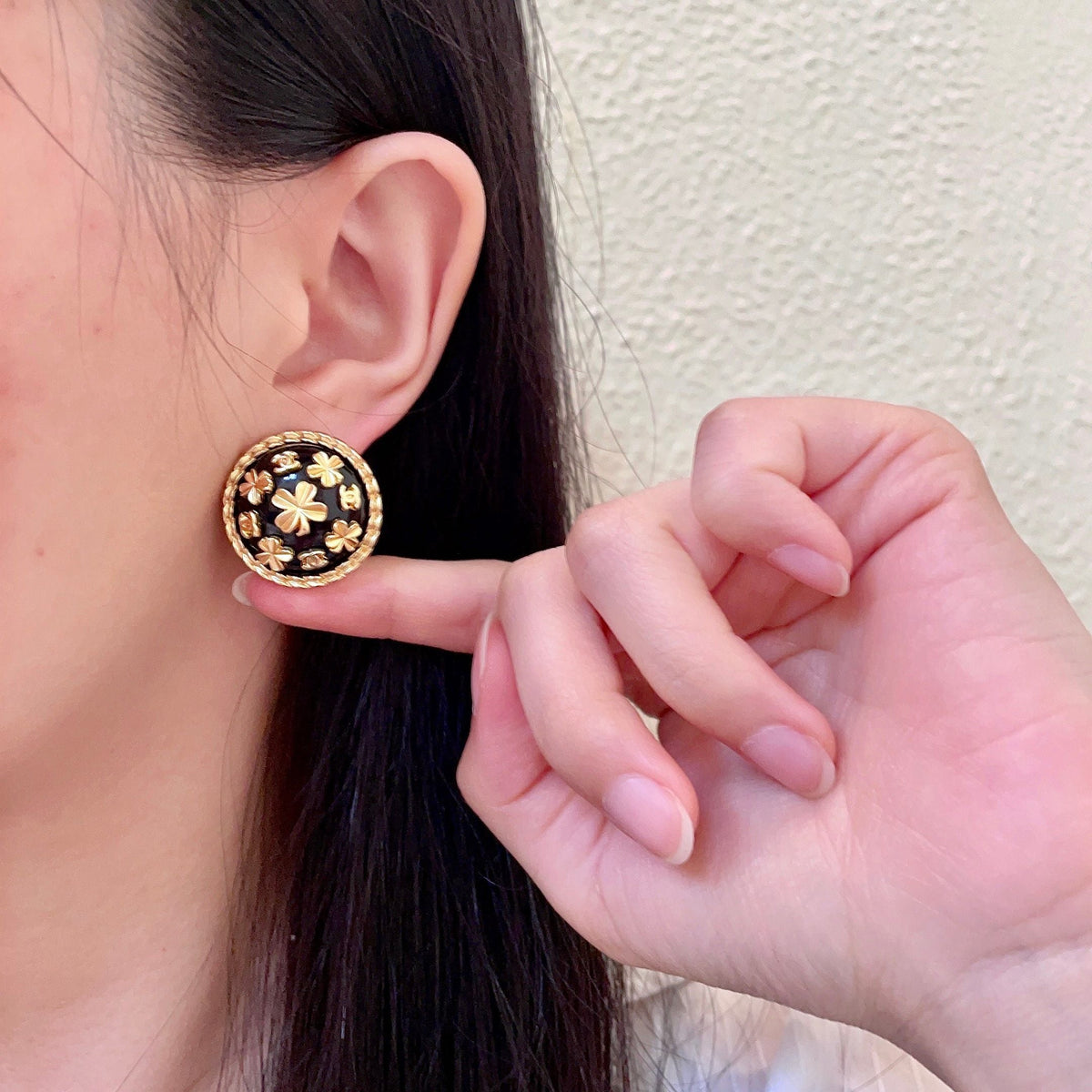 Martin Graham stud earrings in polished metal-tone – front product view