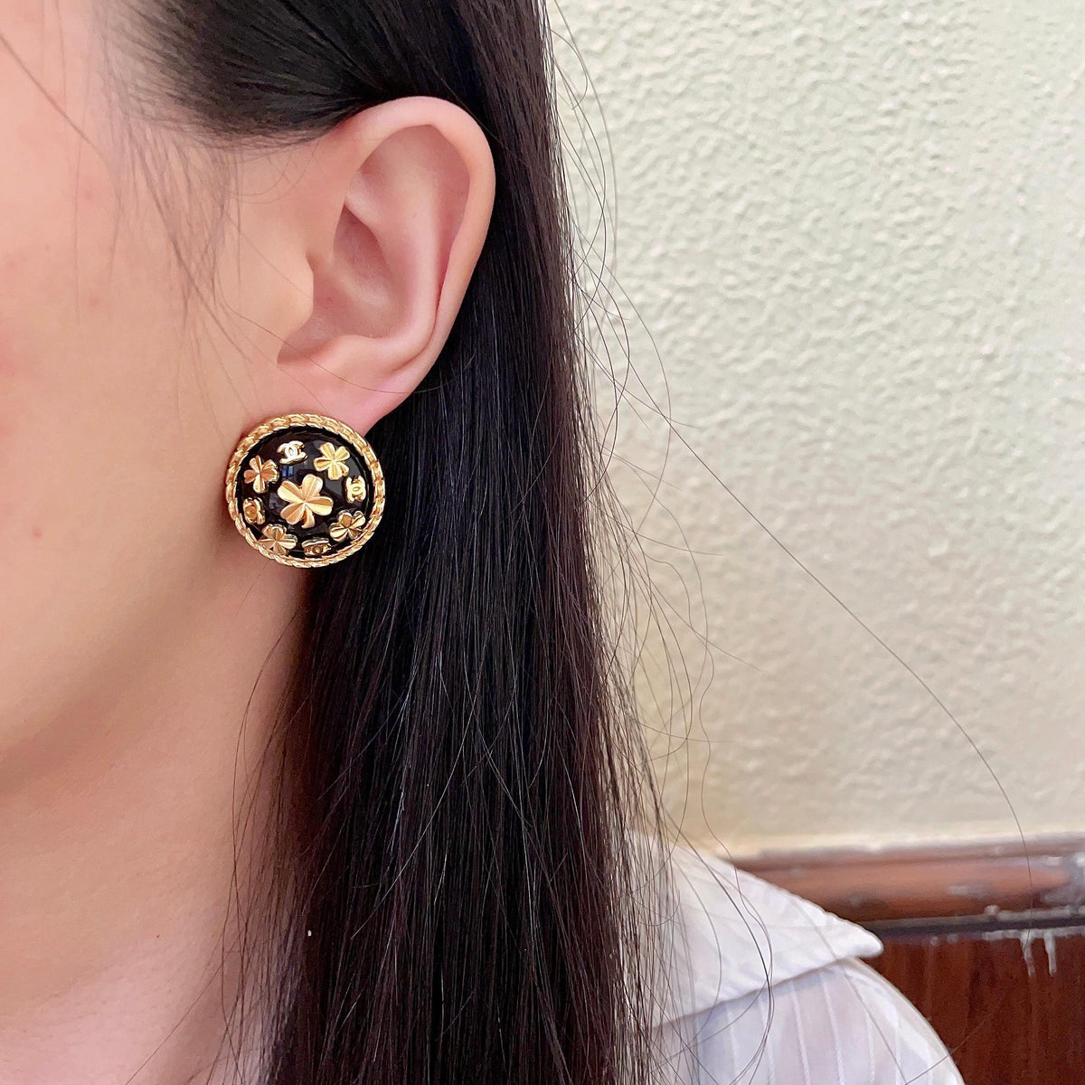 Martin Graham stud earrings in polished metal-tone – detail view