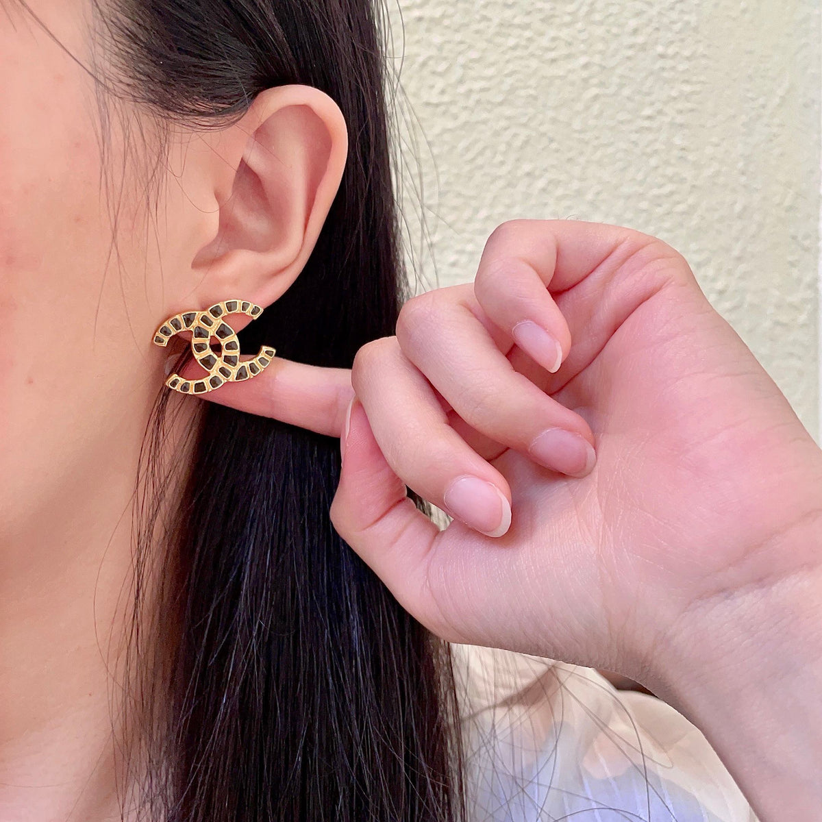 Martin Graham stud earrings in polished metal-tone – front product view