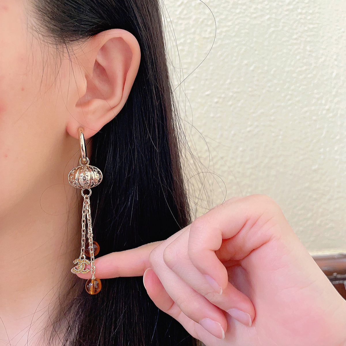 Martin Graham earrings in polished metal-tone – front product view