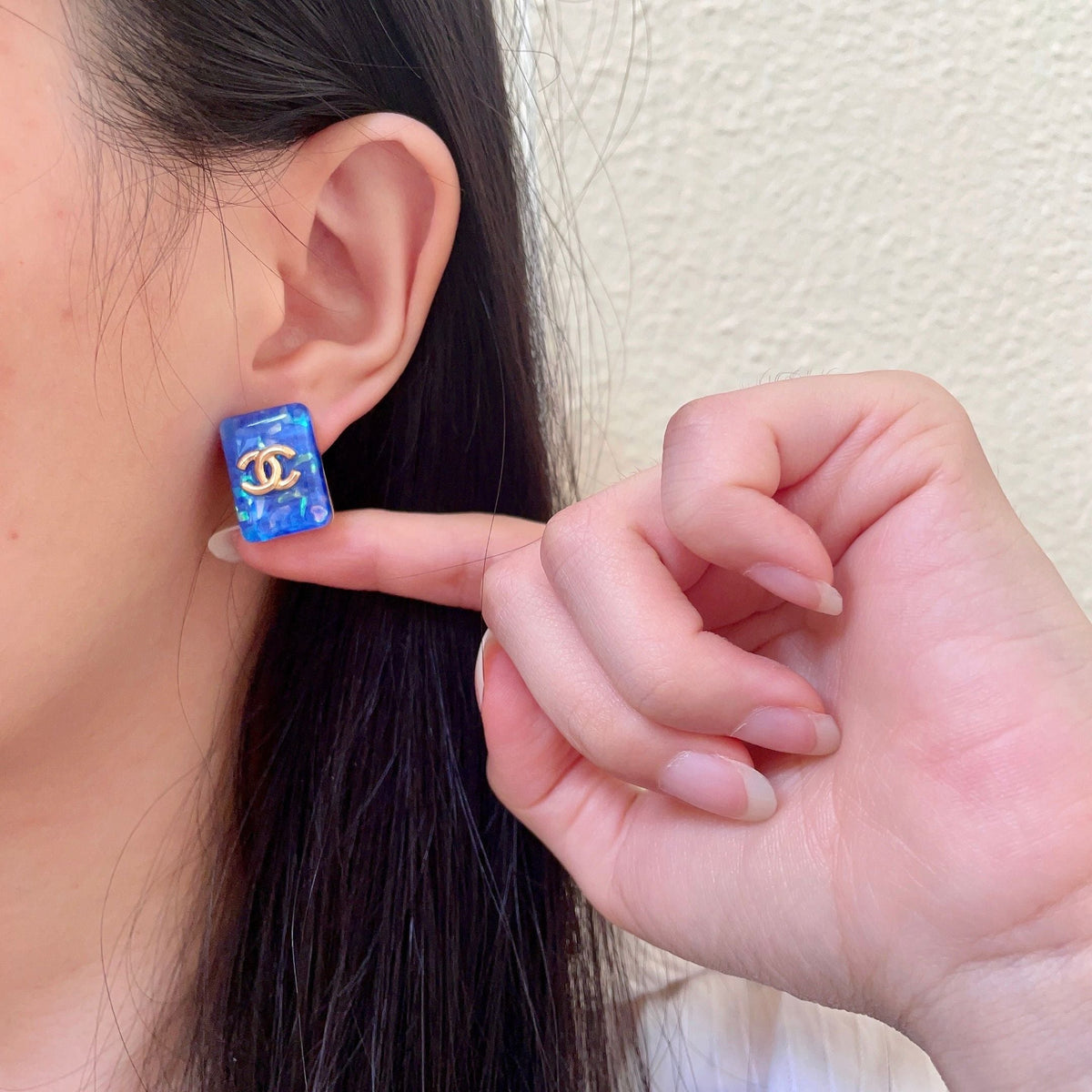 Martin Graham stud earrings in polished metal-tone – front product view
