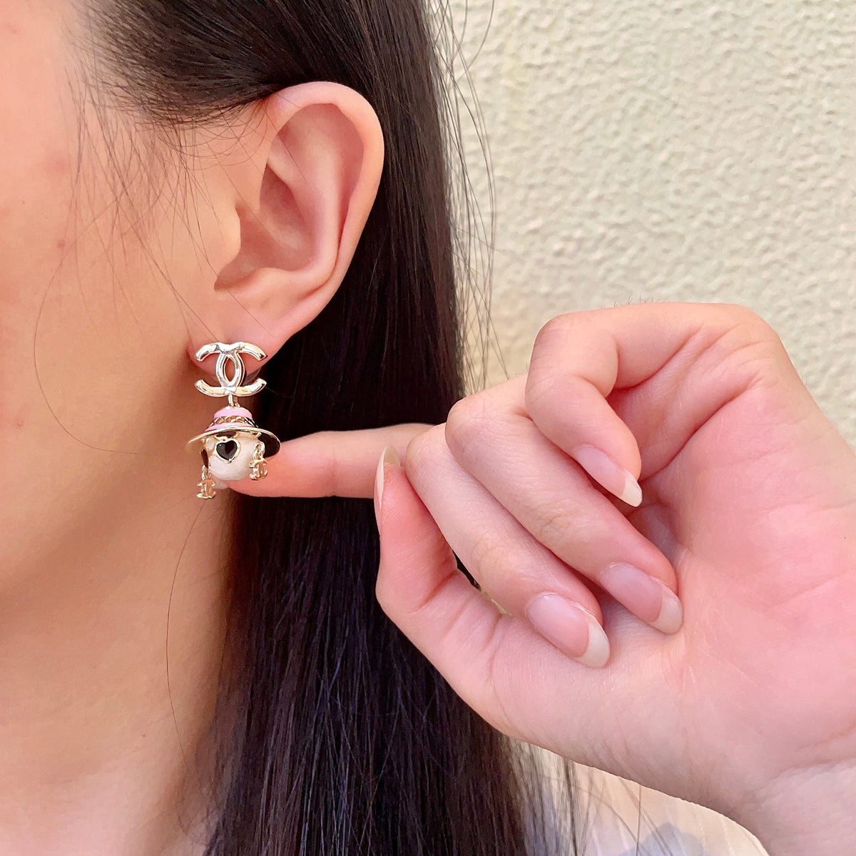 Martin Graham earrings in polished metal-tone – front product view