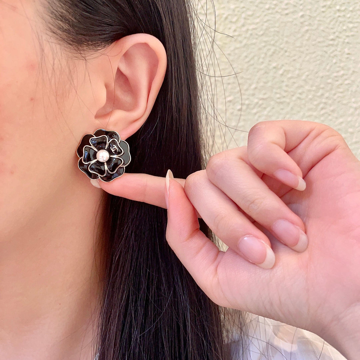 Martin Graham stud earrings in polished metal-tone – front product view