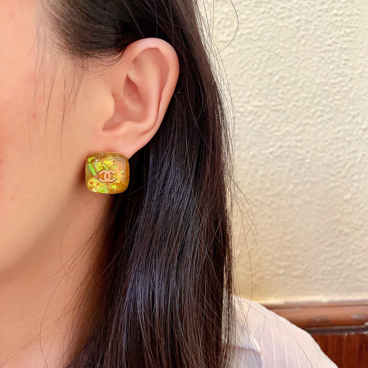 Martin Graham stud earrings in polished metal-tone – detail view