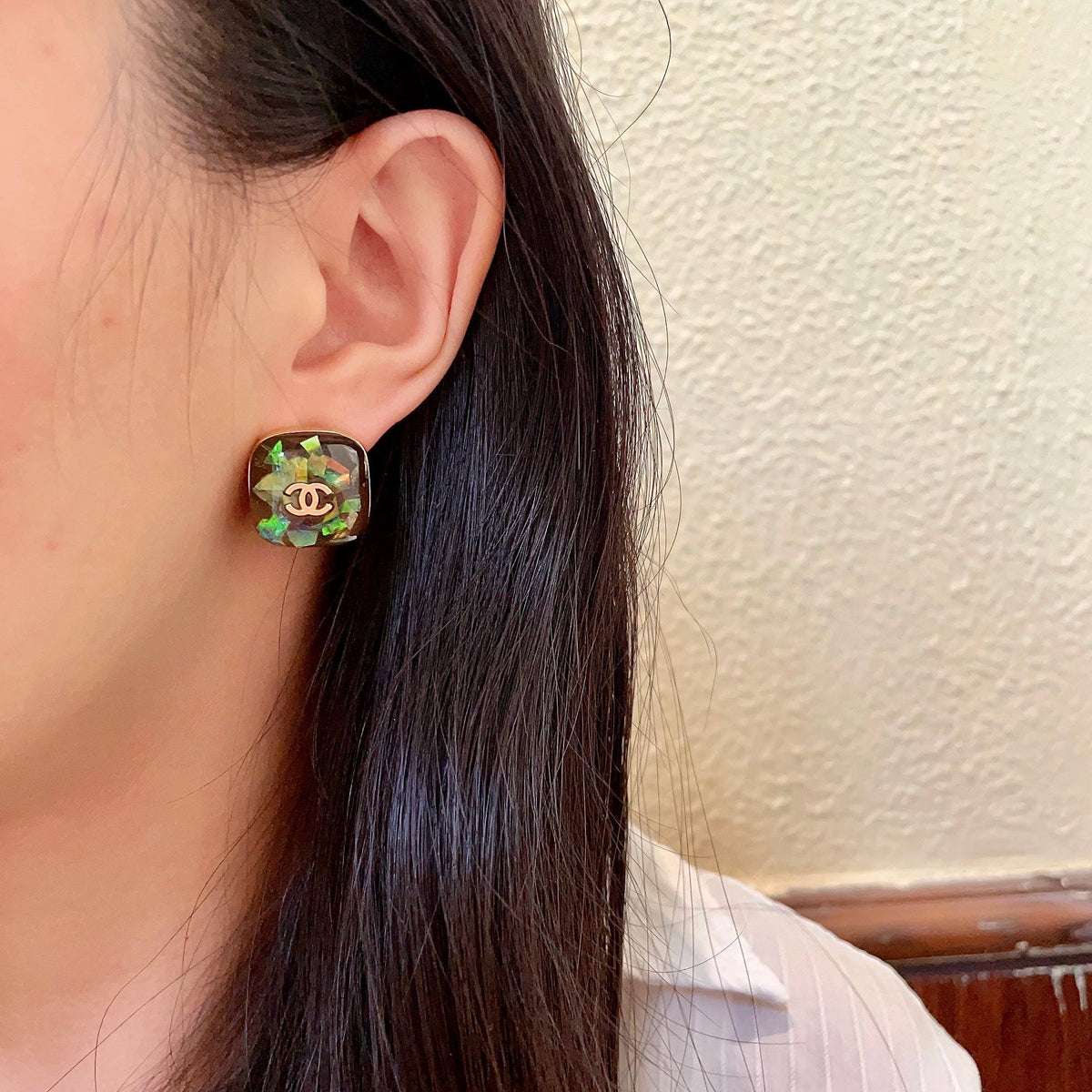 Martin Graham stud earrings in polished metal-tone – detail view