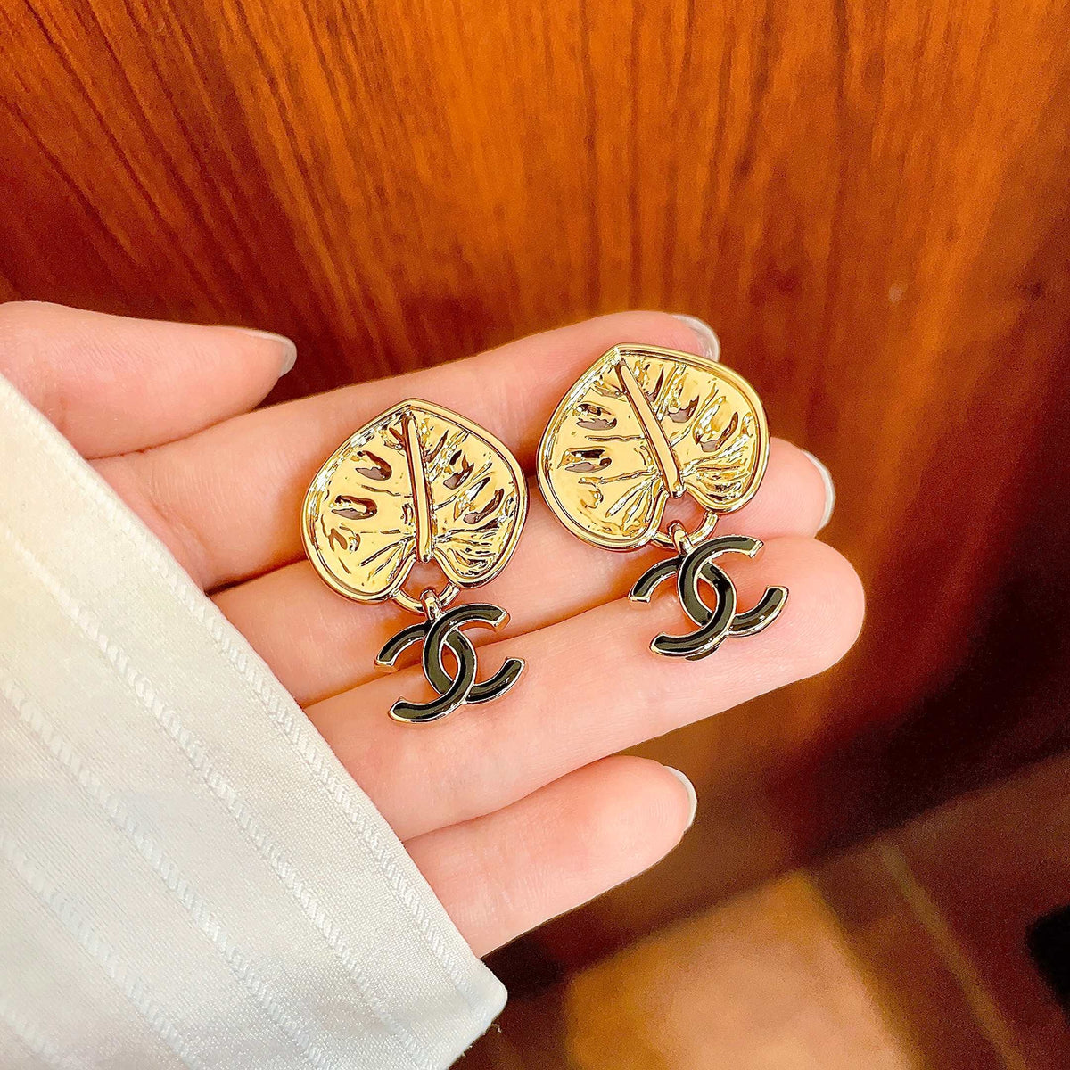 Martin Graham earrings in polished metal-tone – side detail