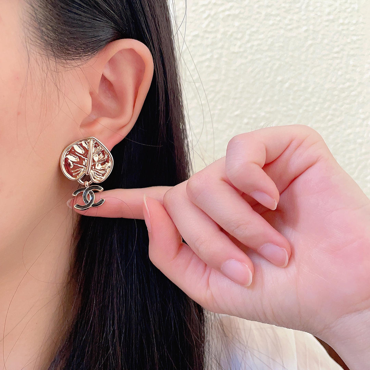 Martin Graham earrings in polished metal-tone – front product view