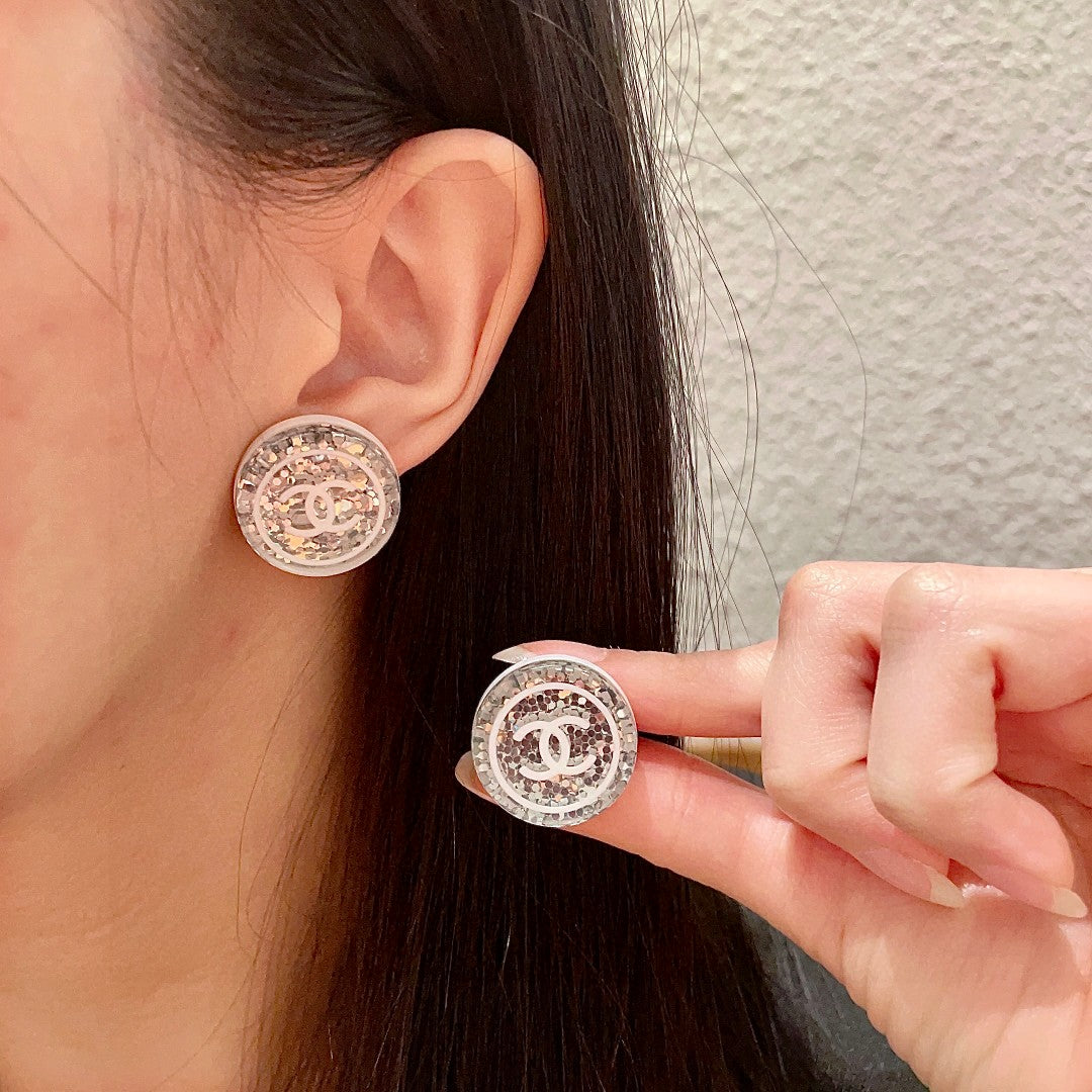 Martin Graham stud earrings in polished metal-tone – main product view