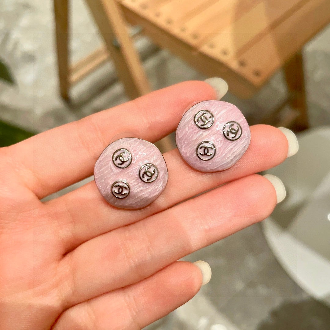 Martin Graham stud earrings in polished metal-tone – side detail