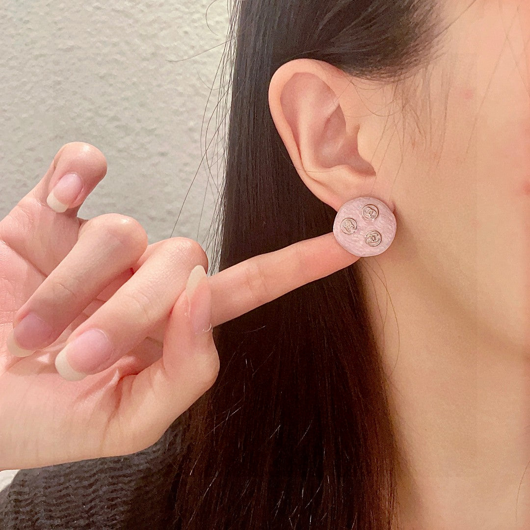 Martin Graham stud earrings in polished metal-tone – front product view