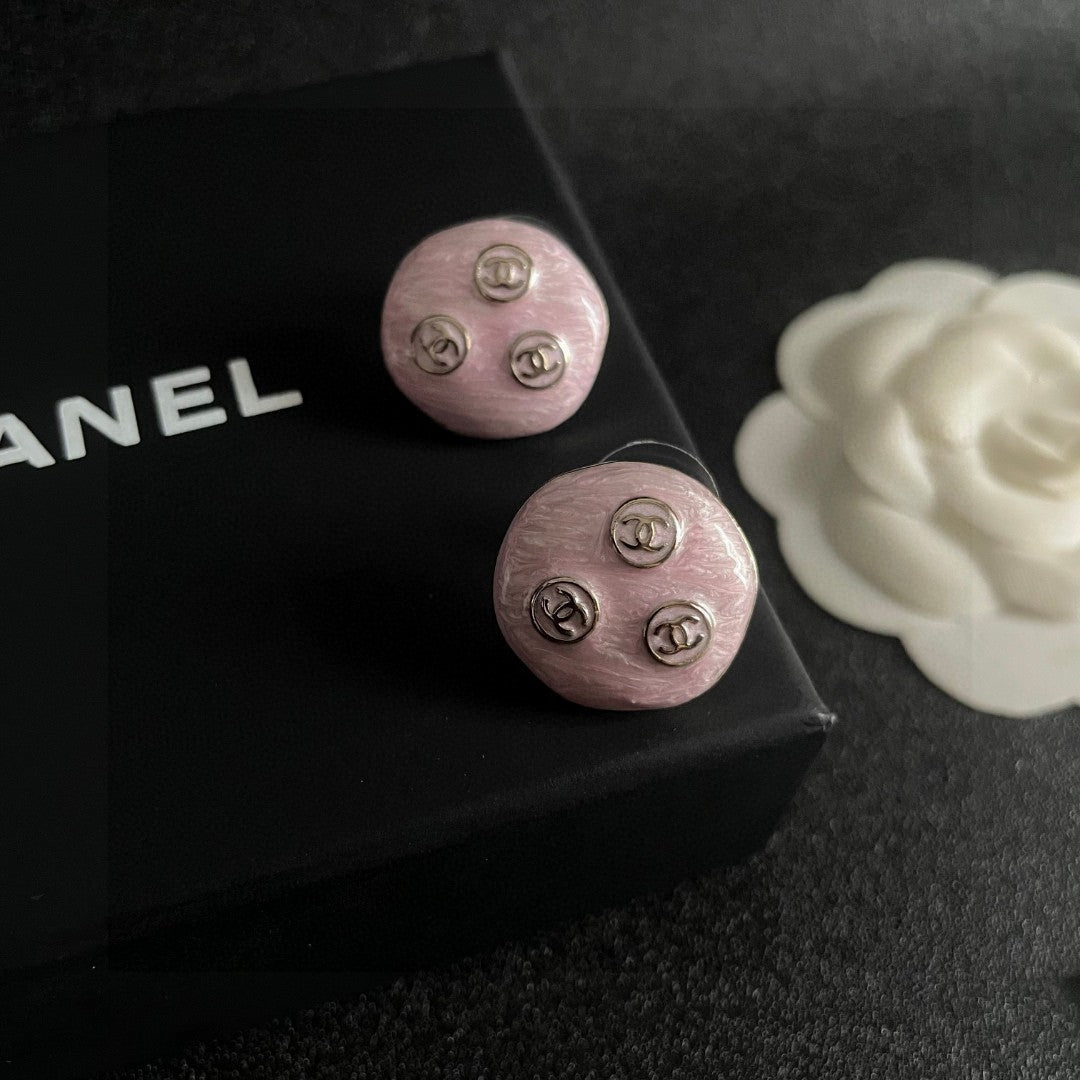 Martin Graham stud earrings in polished metal-tone – detail view
