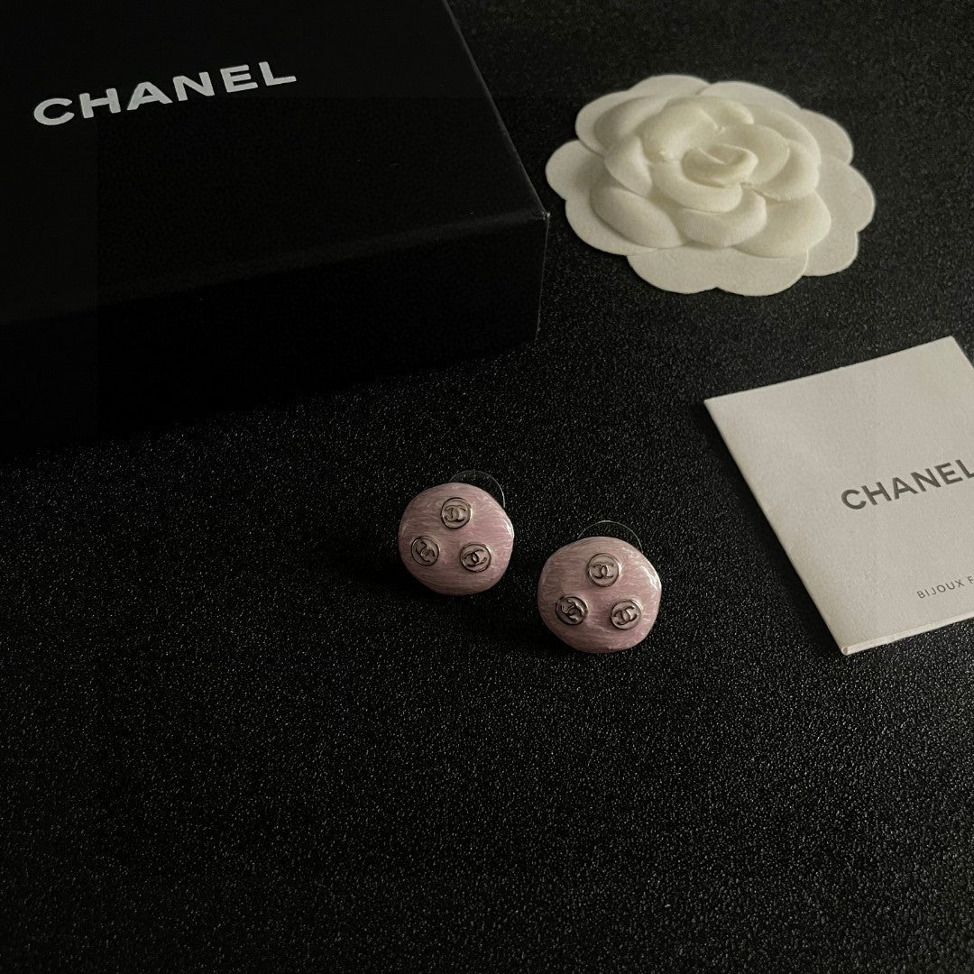 Martin Graham stud earrings in polished metal-tone – styled product view