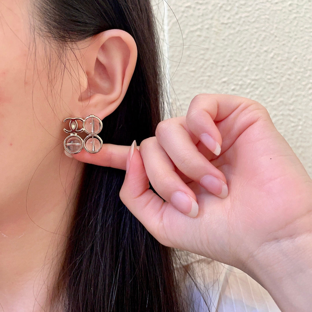 Martin Graham stud earrings in polished metal-tone – front product view