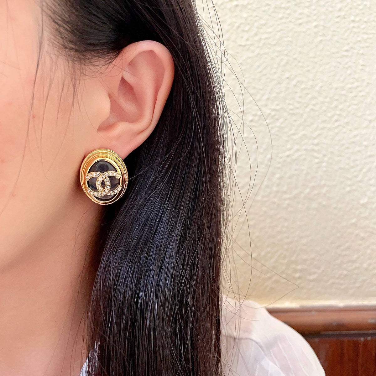 Martin Graham stud earrings in polished metal-tone – detail view