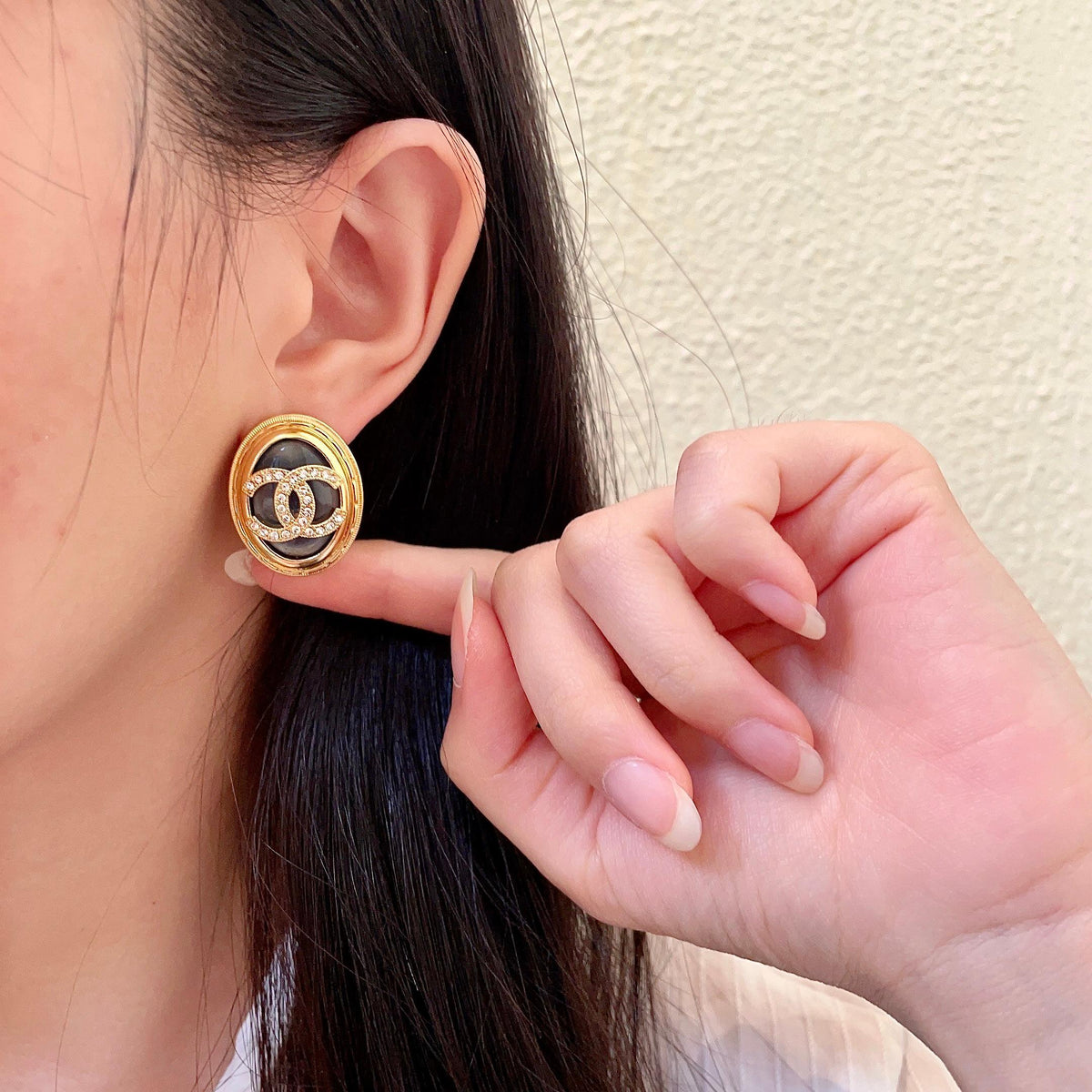 Martin Graham stud earrings in polished metal-tone – front product view