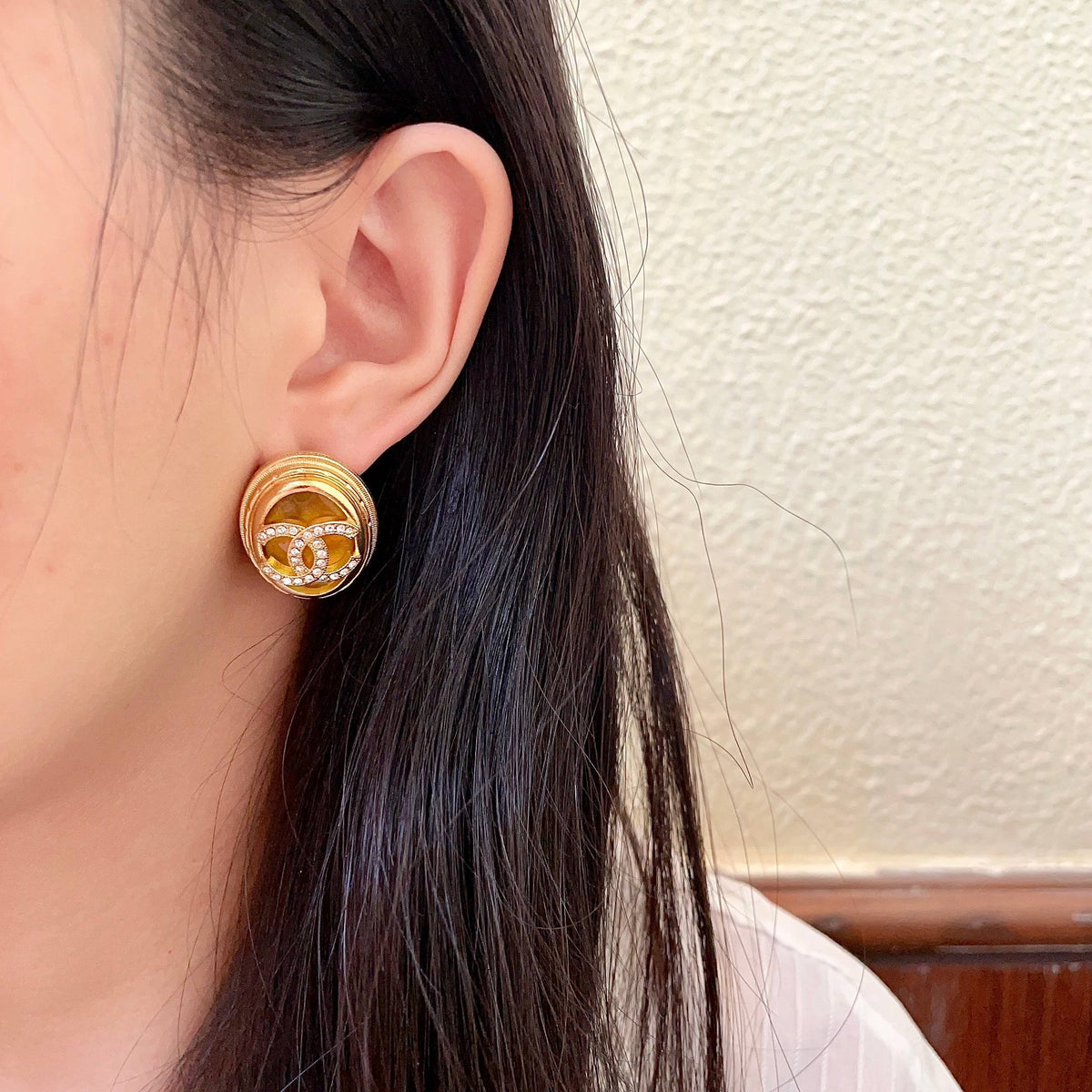 Martin Graham stud earrings in polished metal-tone – detail view