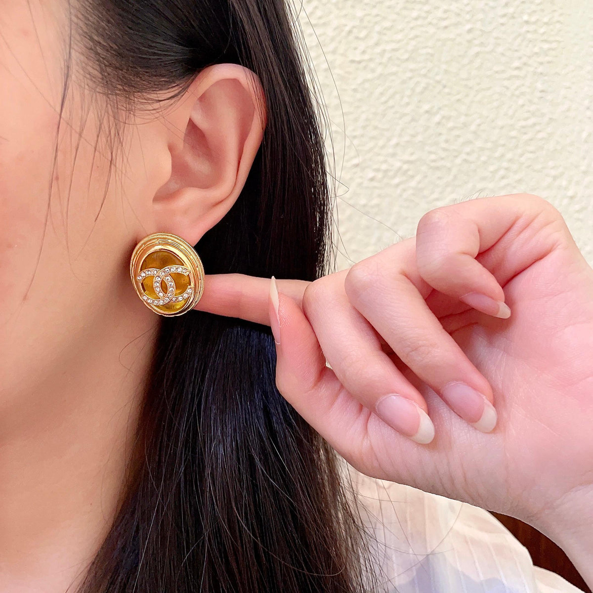 Martin Graham stud earrings in polished metal-tone – front product view
