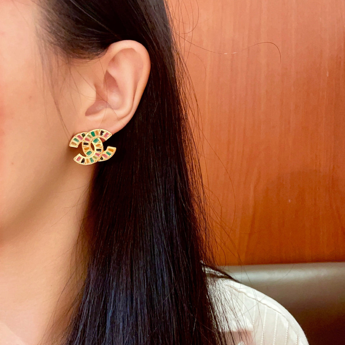 Martin Graham stud earrings in polished metal-tone – detail view