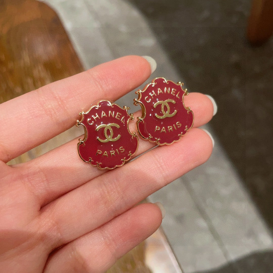 Martin Graham stud earrings in polished metal-tone – side detail