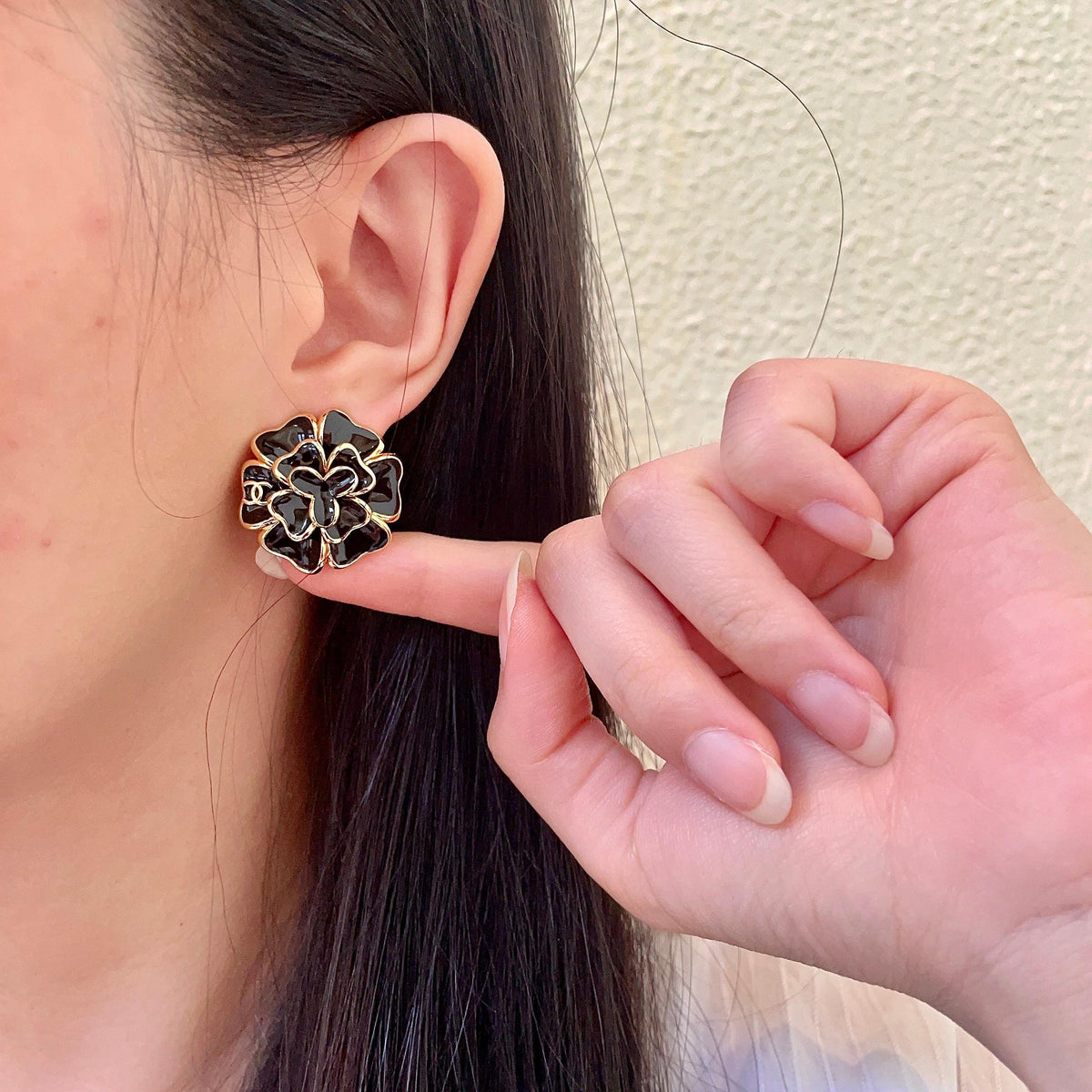 Martin Graham stud earrings in polished metal-tone – front product view