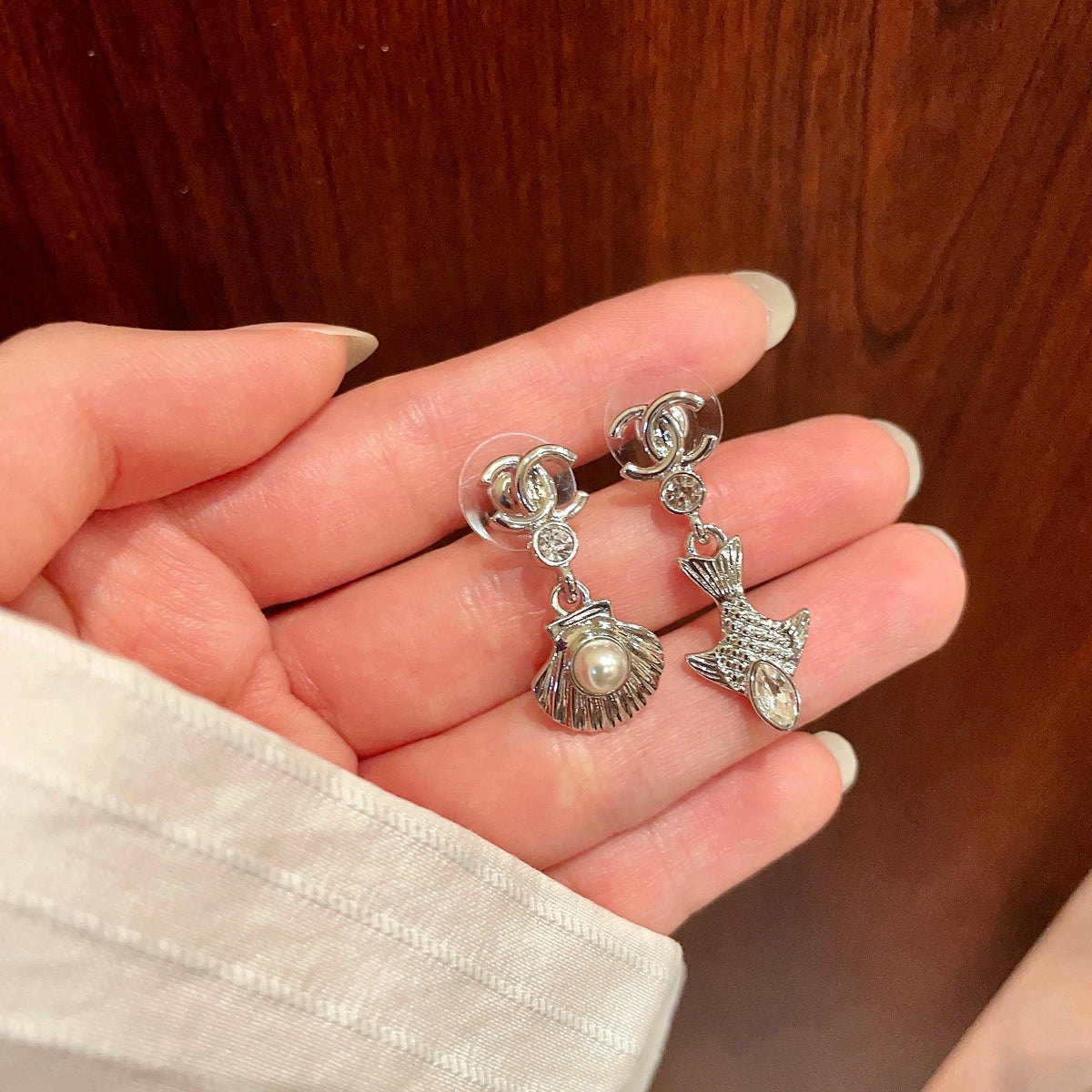 Martin Graham earrings in polished metal-tone – side detail